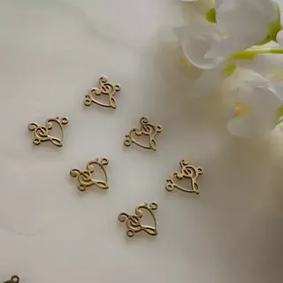 پلاک آویز ساعتی طرح قلب و نت طلایی(فروش محصول  بصورت دونه ای میباشد)