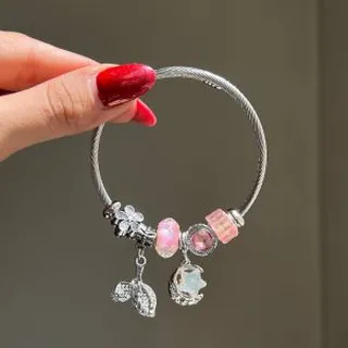 دستبند پاندورا صورتی طرح دم وال