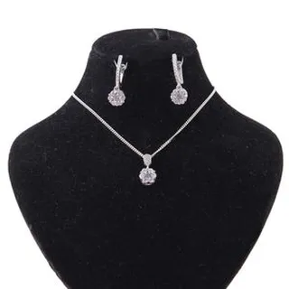 نیم ست نقره زنانه بازرگانی میلادی مدل گل جواهری فول نگین کد NTR_409