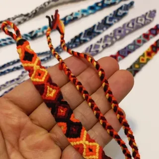 حراج بسته ده عددی دستبند بافت کاموا رنگبندی متنوع