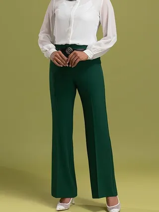 شلوار زنانه پارچه ای کرپ کنزو از بالا کشاد ریزشی کلاسیک پرسته یشمی