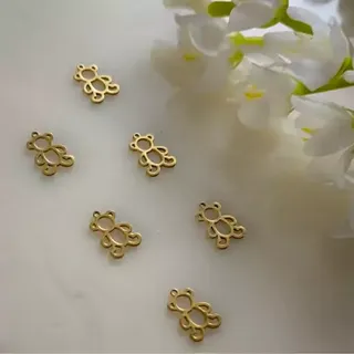 پلاک آویز ساعتی طرح تدی طلایی(فروش محصول  بصورت دونه ای میباشد)
