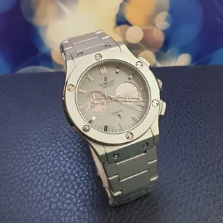 ساعت مردانه �و پسرانه طرح هابلوت بند فلزی با گارانتی موتور Hublot 