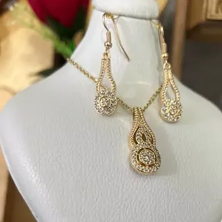 نیم ست زنانه طرح طلا نگین دار
