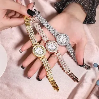 ساعت دستبندی جینوا زنونه فلزی فول نگین طرح یونانی دارای جعبه و باتری اضافه 